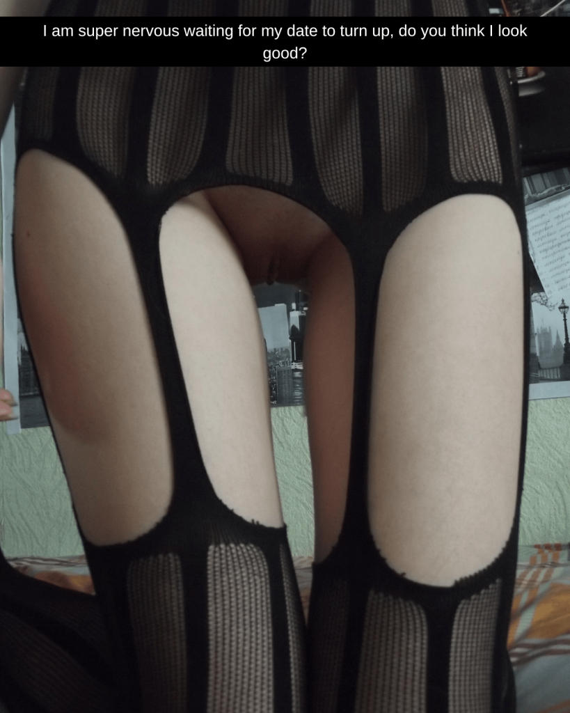 Photo taken of a woman's legs, she is wearing stockings and no panties, we can see her bare pussy