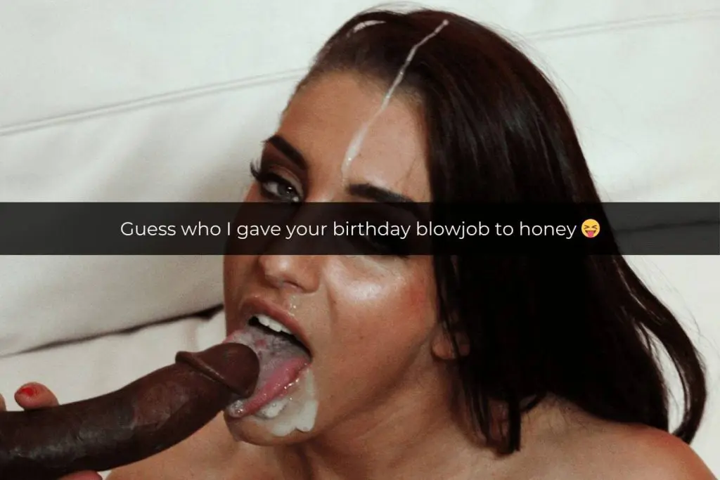 Woman looking at the camera, sucking a black dick with jizz all over her mouth and chin