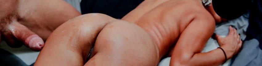cheating wife laying with cum all over her ass while bull stands naked next to her