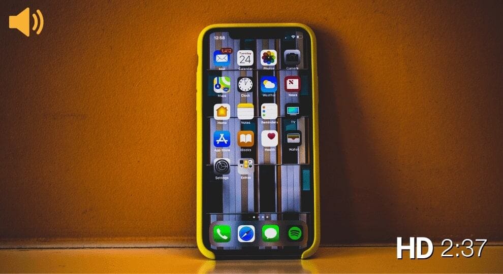 iphone leaning against a wall
