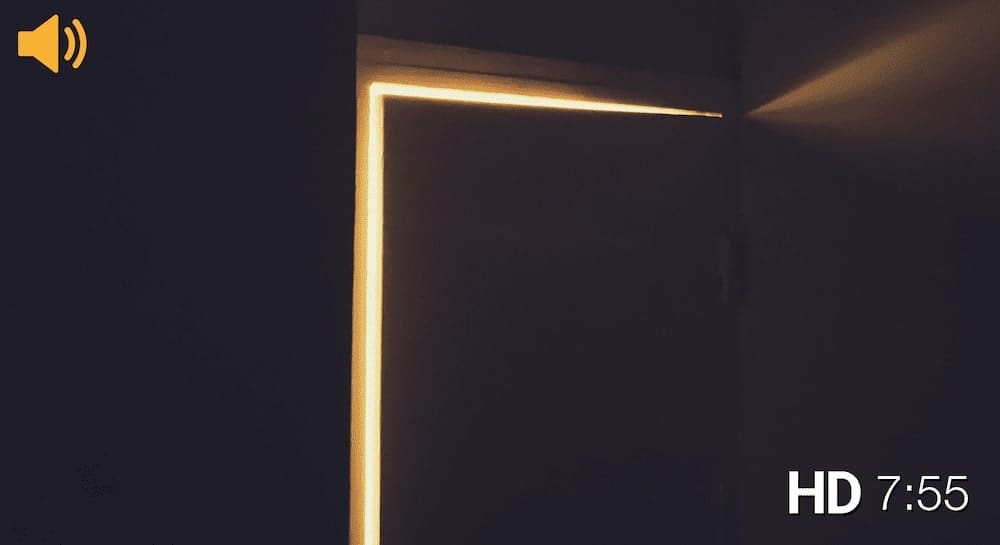 slightly open door with light coming through from the other side